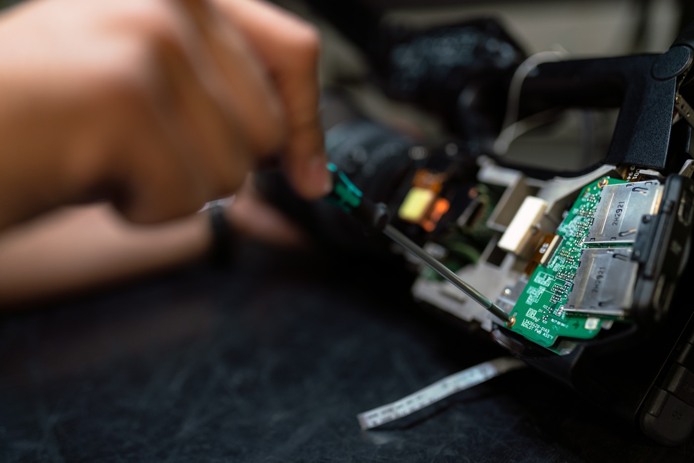 Technician servicing industrial control hardware